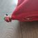 Red Moroccan cushion with cotton pompom