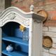 Old bookcase gray & blue wood mouldings