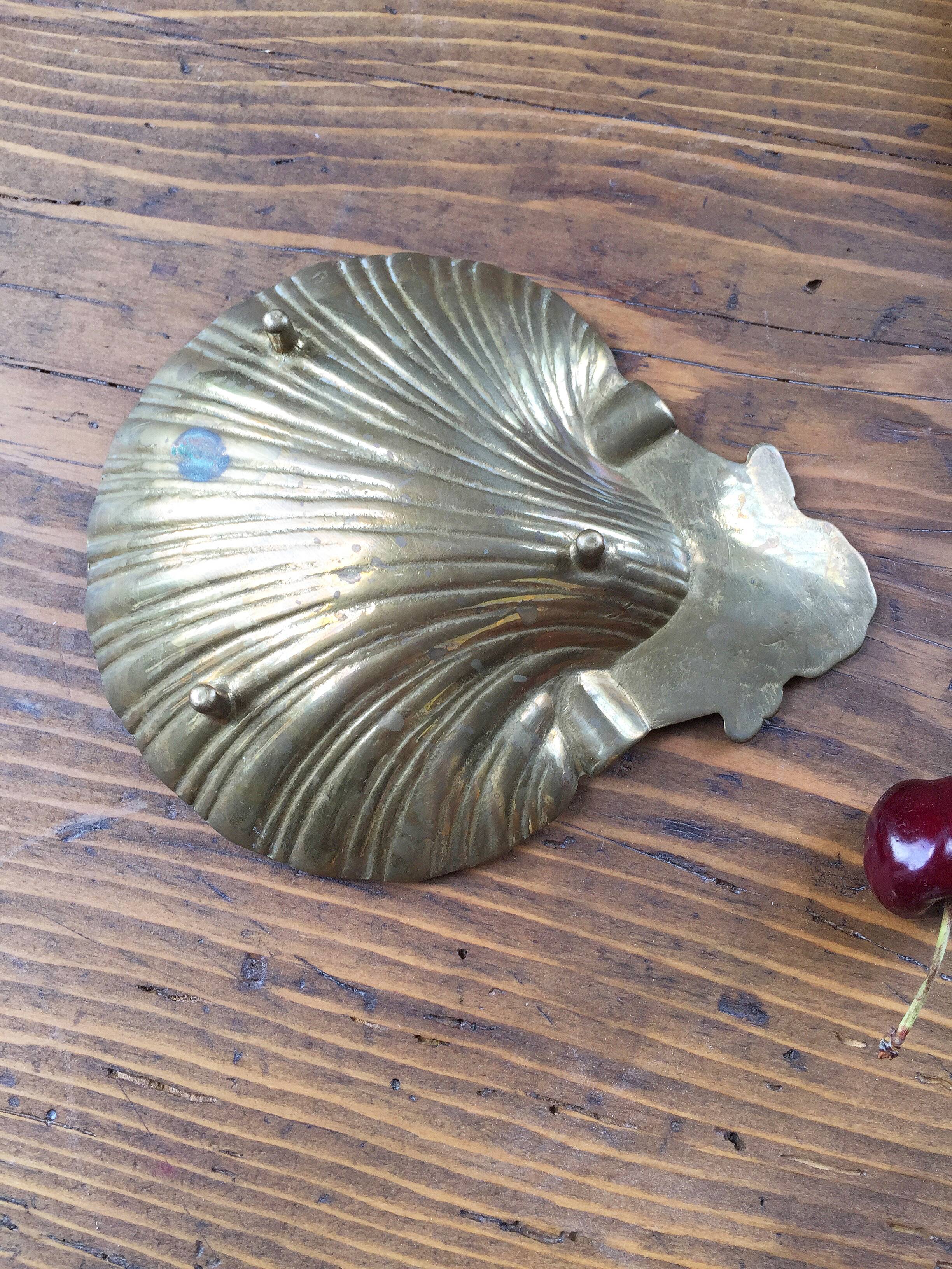 Shell brass ashtray
