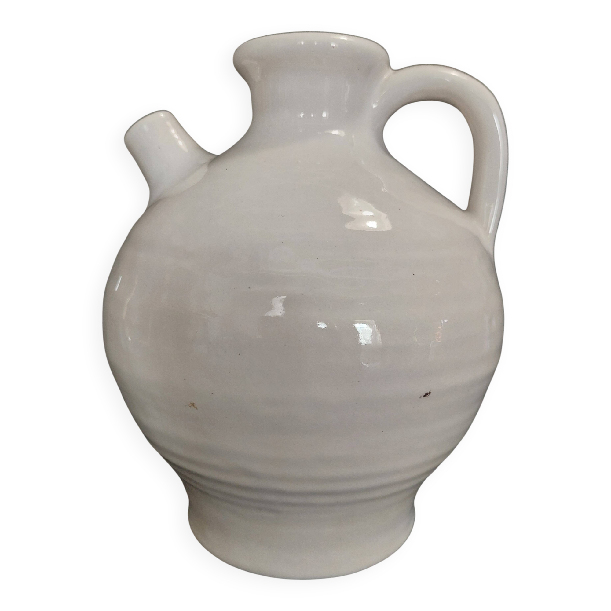 White ceramic goat-shaped creamer, first half of the 20th century.