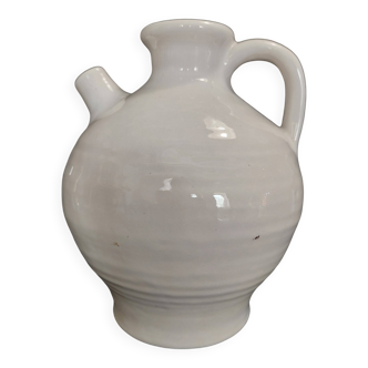 White ceramic goat-shaped creamer, first half of the 20th century.