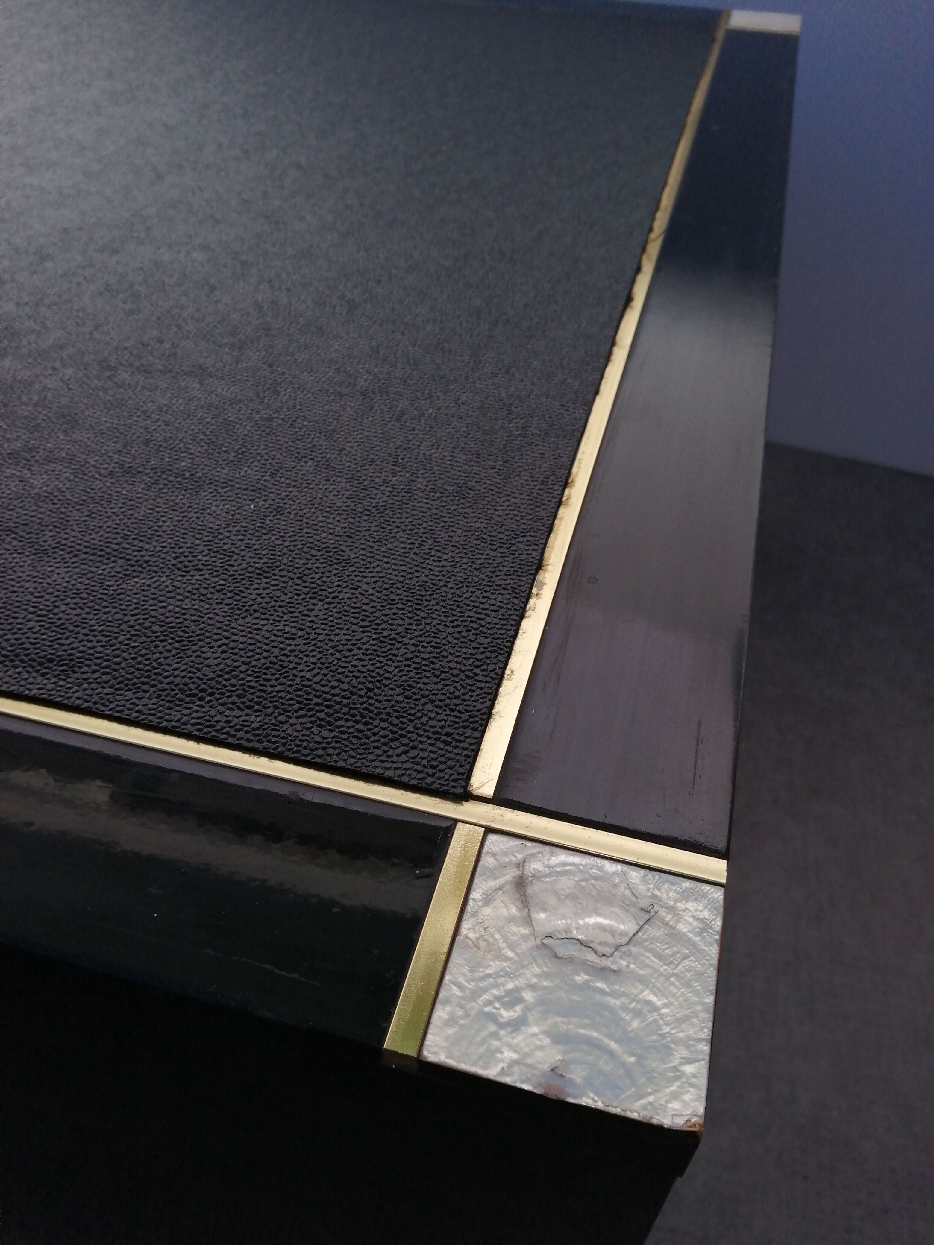 Designer coffee table in black lacquered wood and vintage brass