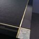 Designer coffee table in black lacquered wood and vintage brass