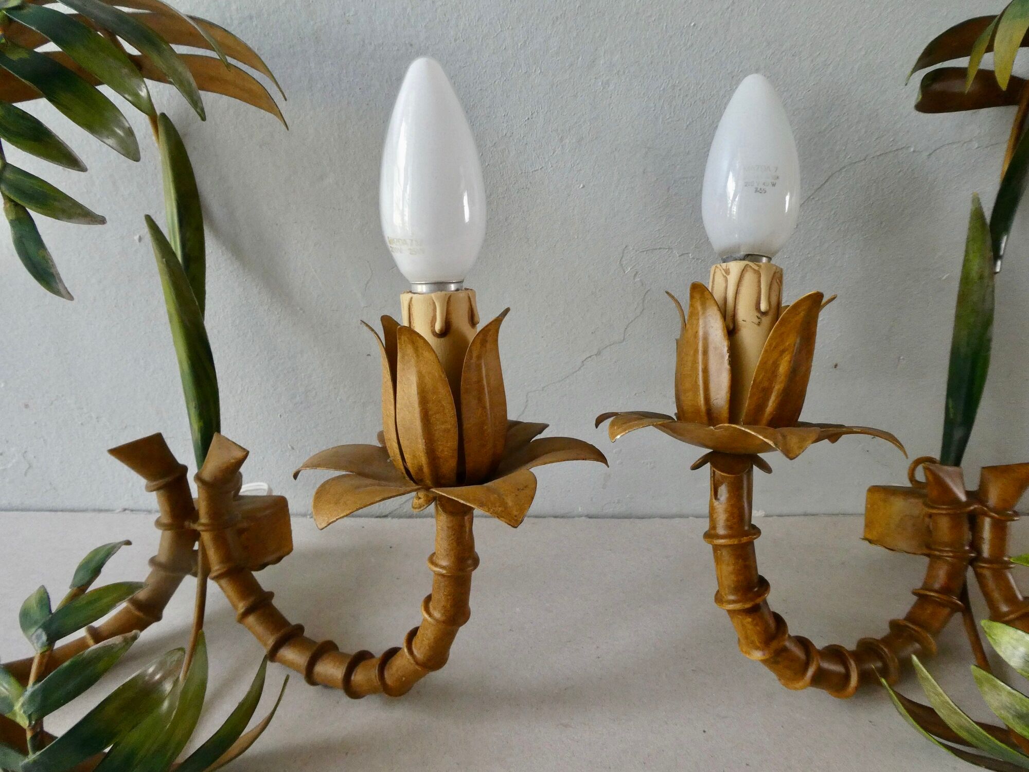 Pair of bamboo and palm sconces in metal 70s