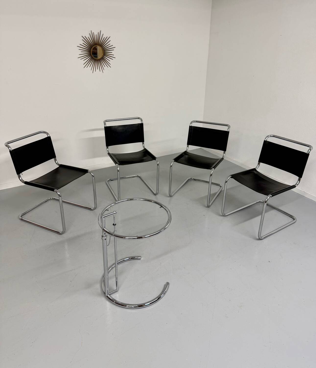 Lot of 4 tubular chairs designed by Mart Stam in vintage black leather from the 1980s.