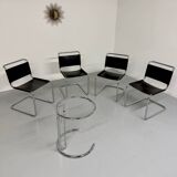 Lot of 4 tubular chairs designed by Mart Stam in vintage black leather from the 1980s.