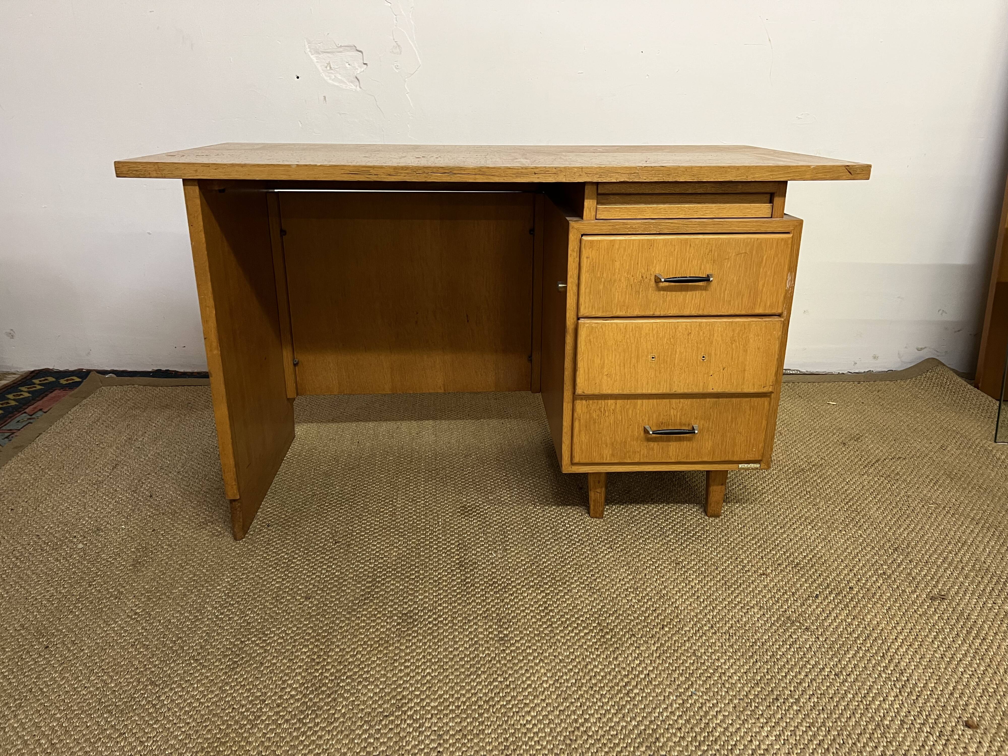 Old wooden desk and armchair