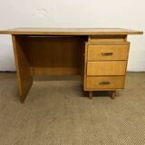 Old wooden desk and armchair