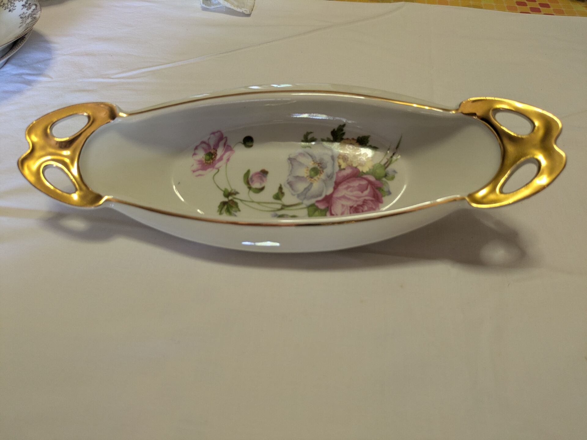 Small oval dish made of Limoges porcelain.