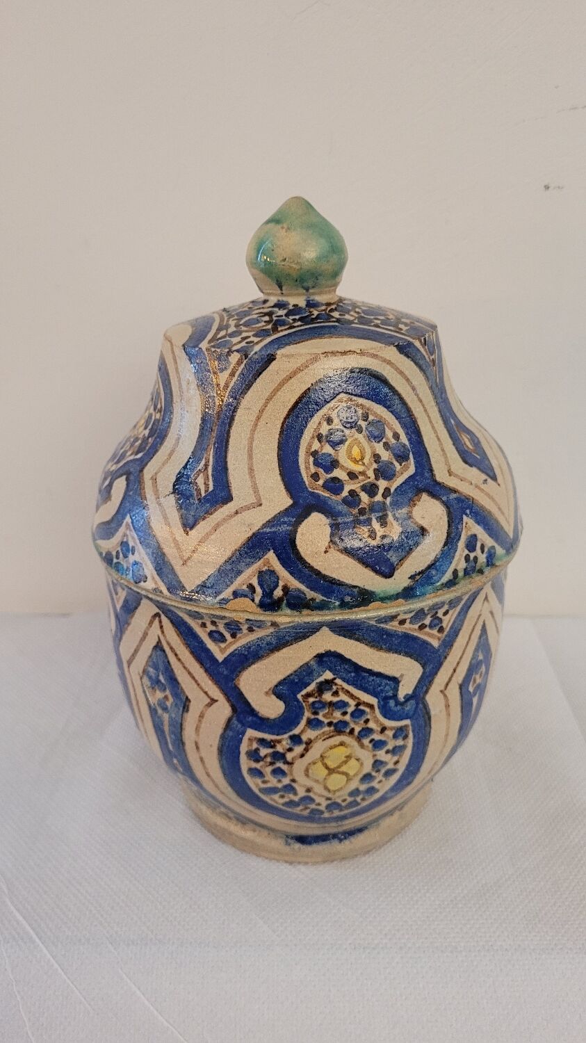 Pot in painted earth