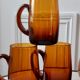 Ensemble composé d’un pichet et de 6 verres ambrés années 70