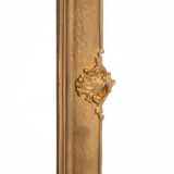 Large French mirror in a gold frame.