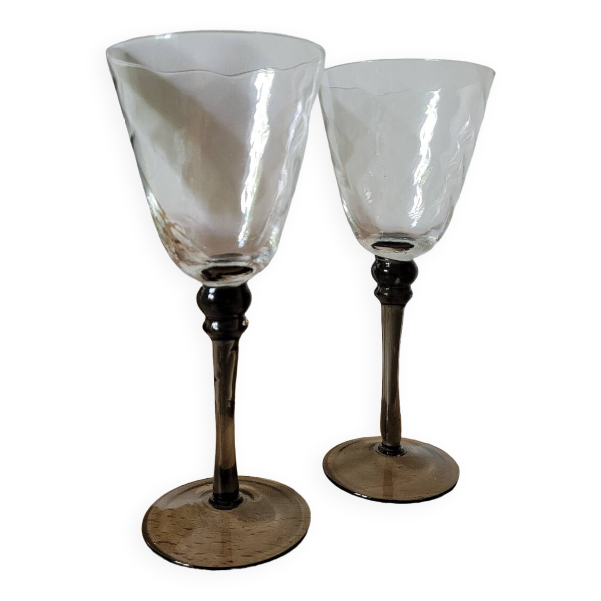 Two smoked black stem wine glasses