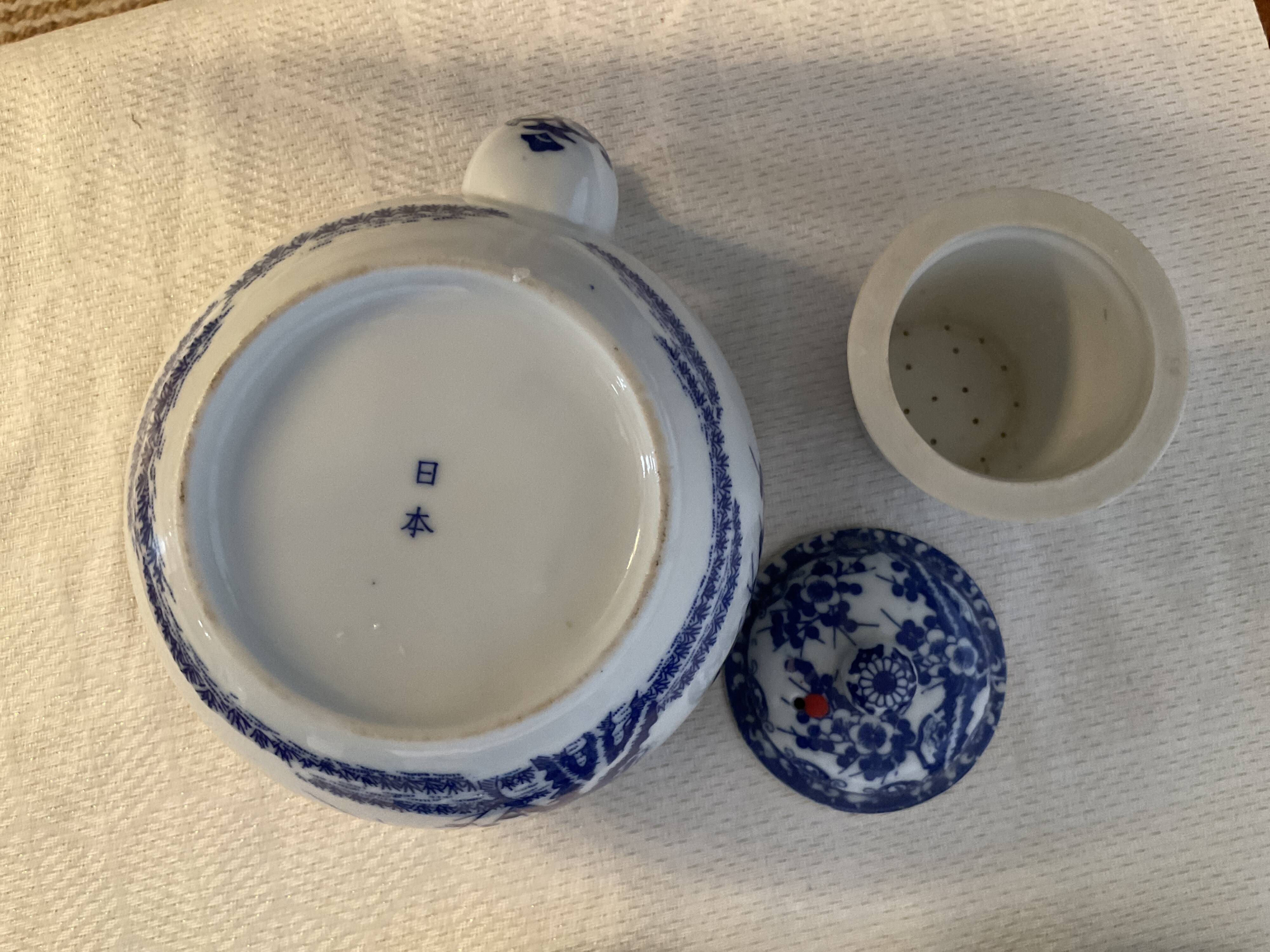 Japanese tea service with cherry blossom decoration in fine porcelain.