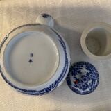 Japanese tea service with cherry blossom decoration in fine porcelain.