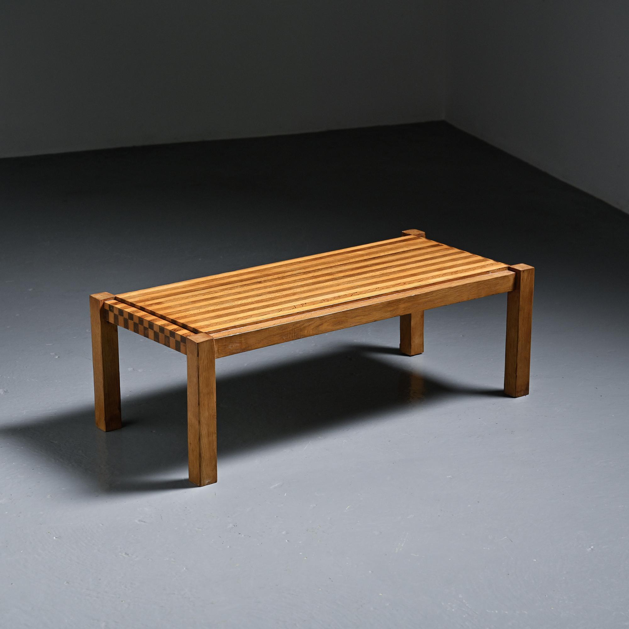 Two-tone wooden graphic coffee table, circa 1960.