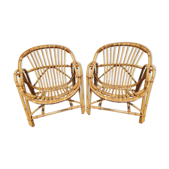 Paire de fauteuils coquille en rotin