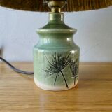 Ceramic lamp, herbarium decoration and fiber blinds