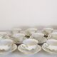 10 anciennes tasses à café avec soucoupes en porcelaine à motifs de fleurs dorées