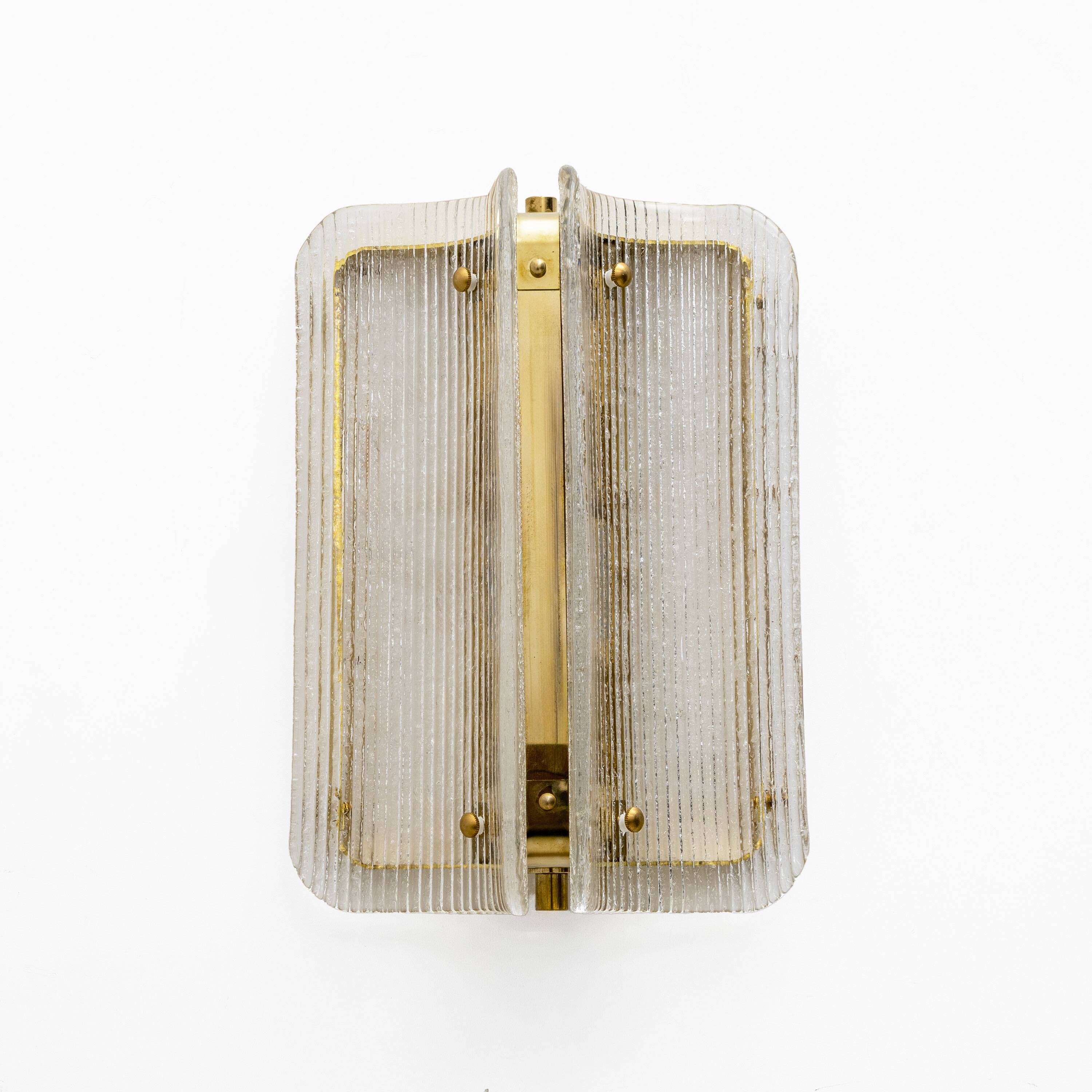 Pair of Curved Clear Ribbed Murano Glass and Brass Wall Sconces
