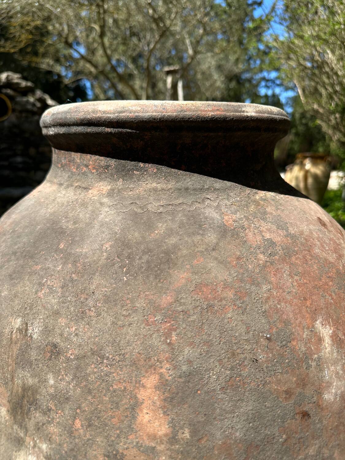 Ancient terracotta pottery jar from the 19th century.