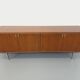Vintage modernist enfilade in rosewood and chrome metal from the 60s and 70s.