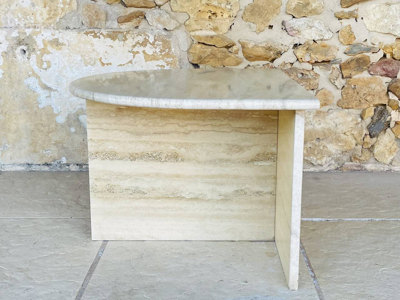Vintage side table in travertine, circa 1980s.