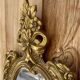 oval decorative wall mirror in Louis XV style