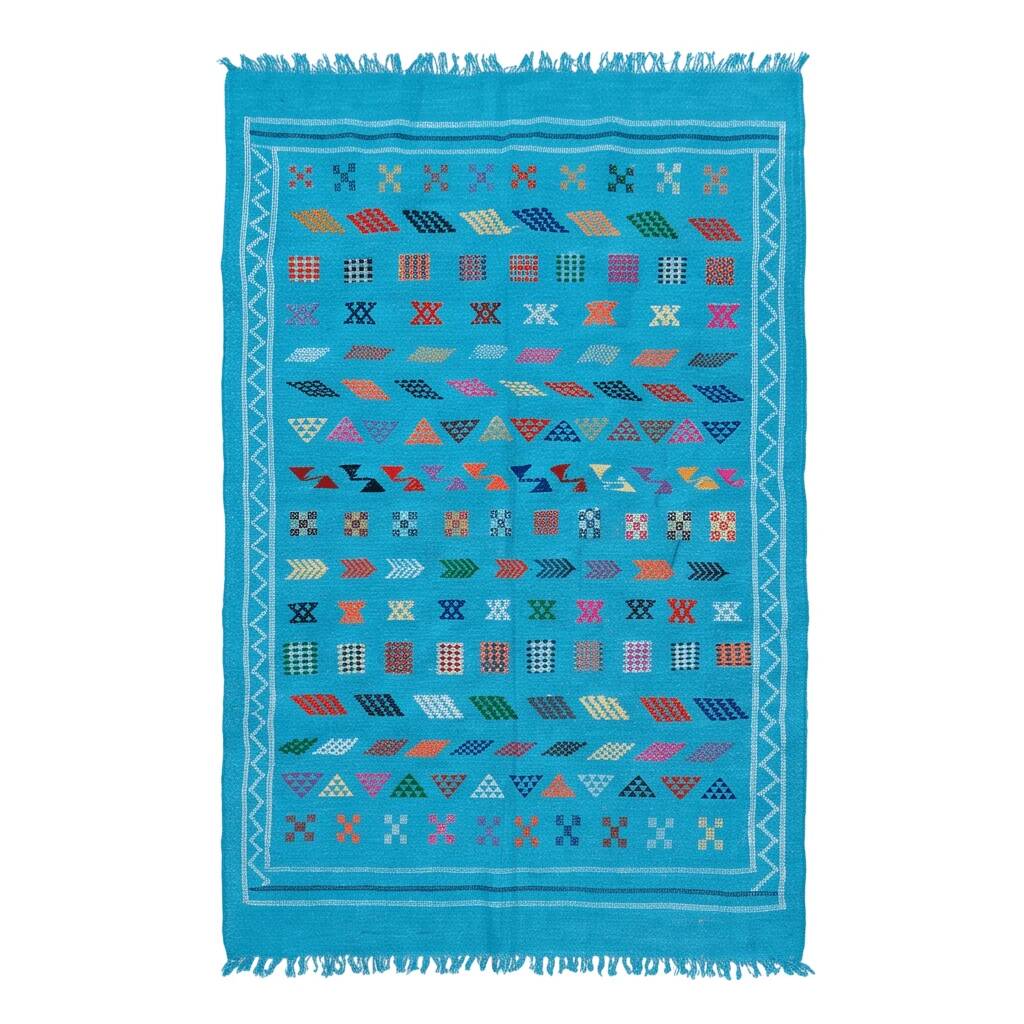 Tapis berbère bleu turquoise motifs multicolores