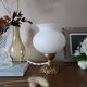Lampe en bronze et opaline