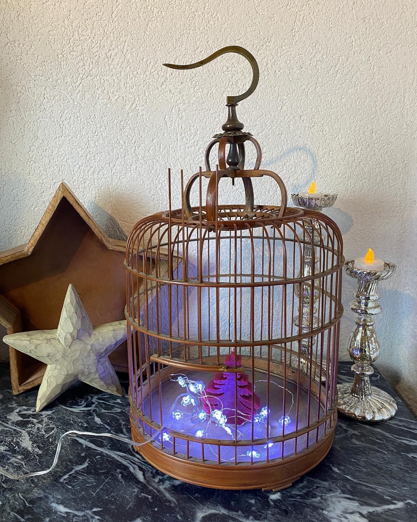 Old bird cage made of bamboo and wood