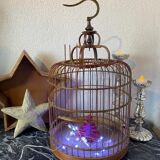 Old bird cage made of bamboo and wood