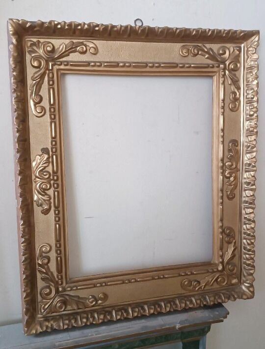 Miroir ancien en bois doré