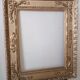 Miroir ancien en bois doré
