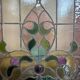 Late 19th century store doors, haberdashery front with Art Nouveau stained glass windows
