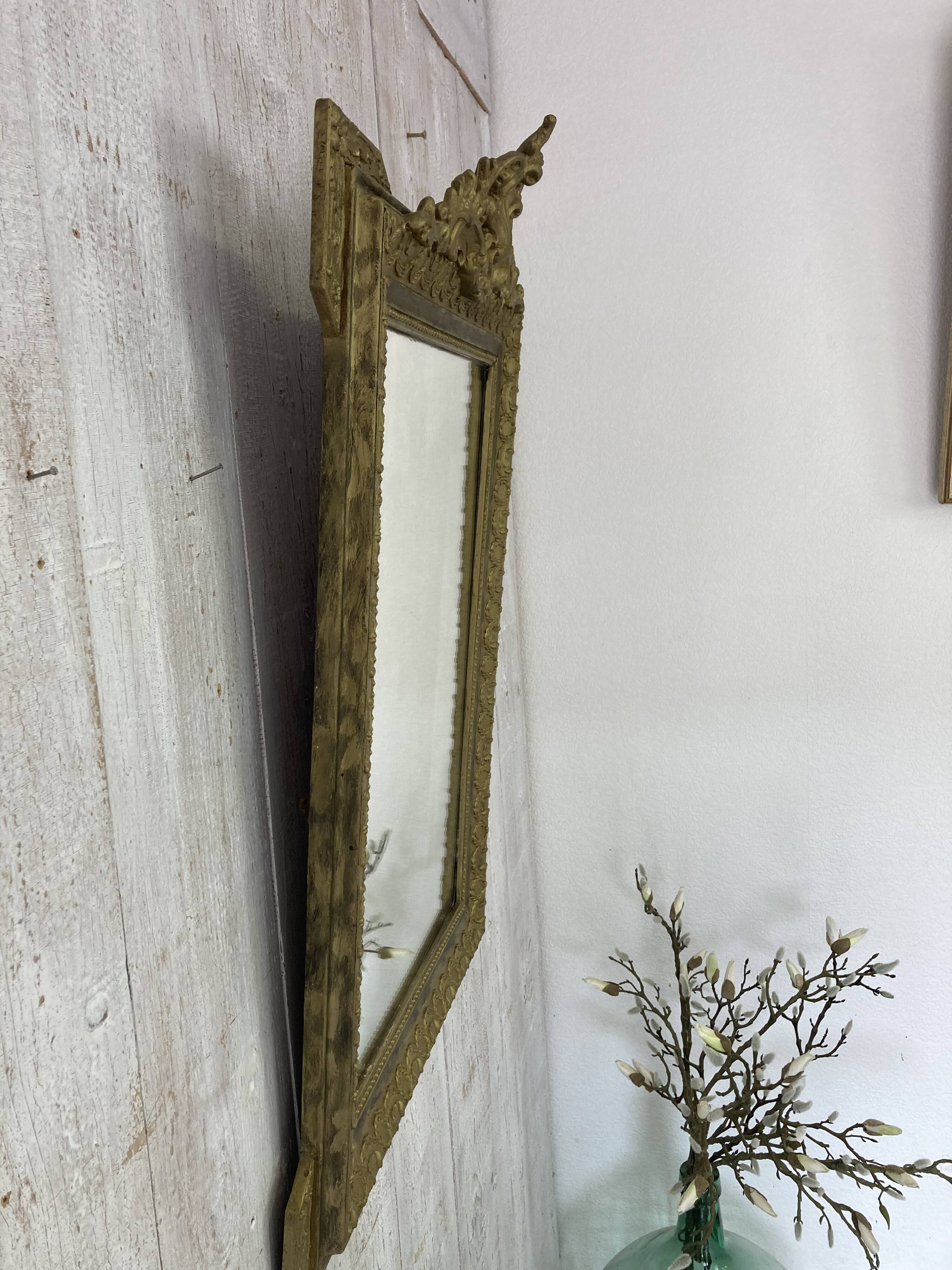 Antique mirror with a pediment