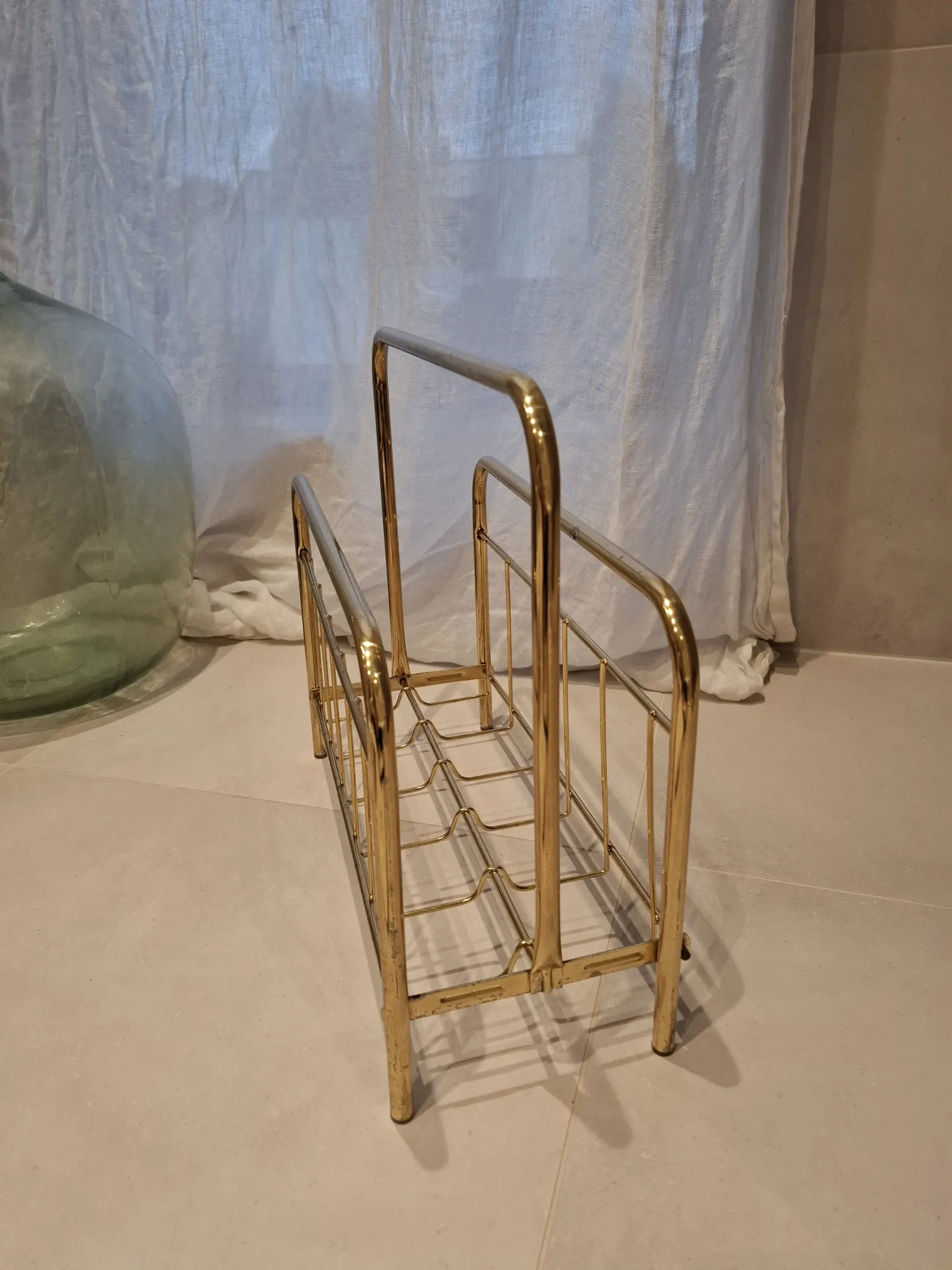 Golden metal magazine rack
