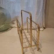 Golden metal magazine rack