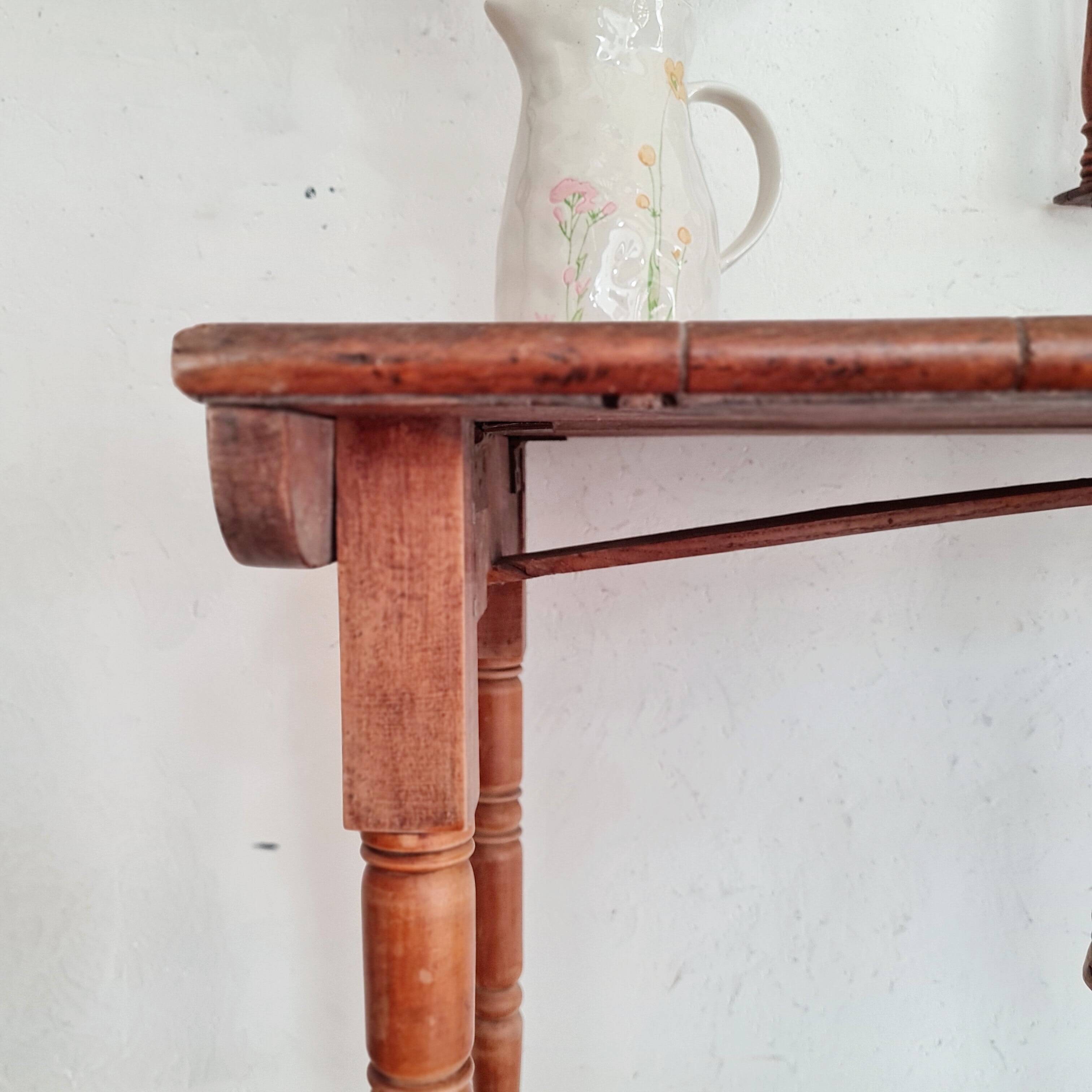 Old wooden table with turned legs - speckled top