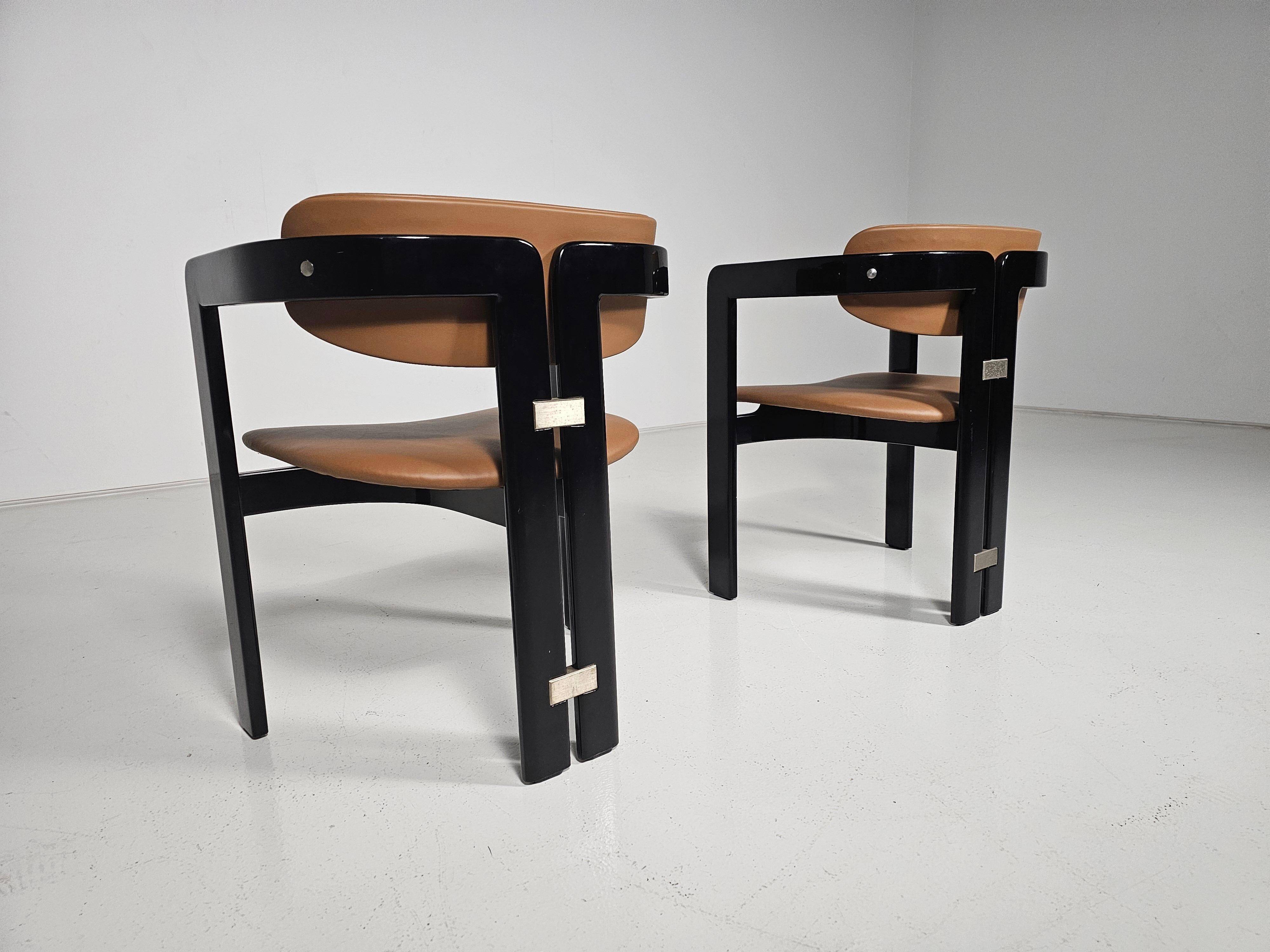 Set of two chairs by Augusto Savini, 1960s.
