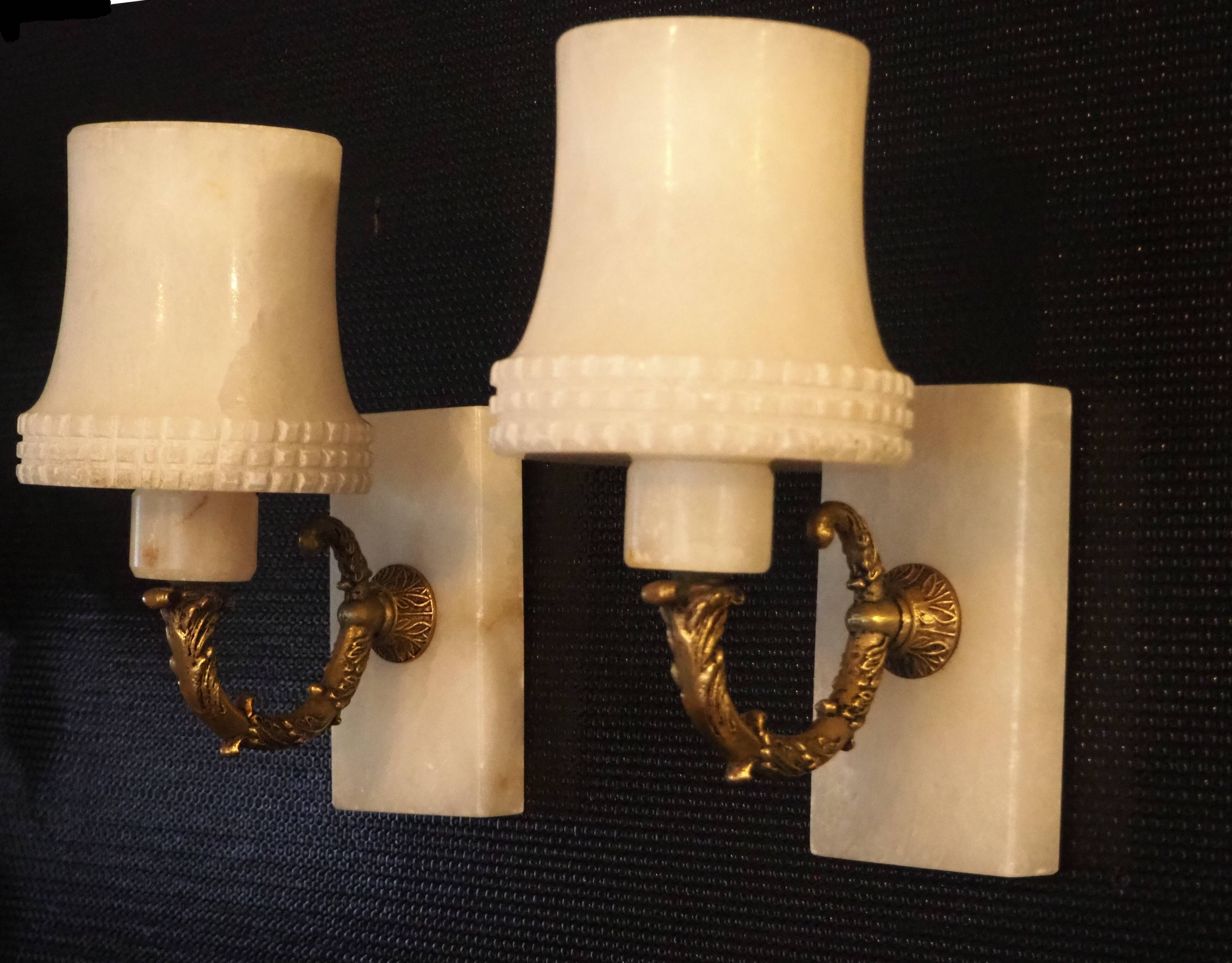 Pair of curved alabaster and bronze appliques