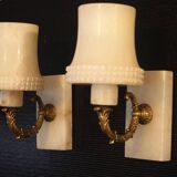 Pair of curved alabaster and bronze appliques