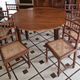 Extendable walnut table, 6 caned chairs in Henri II Neo-Renaissance style.