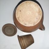 Teapot in ancient sandstone