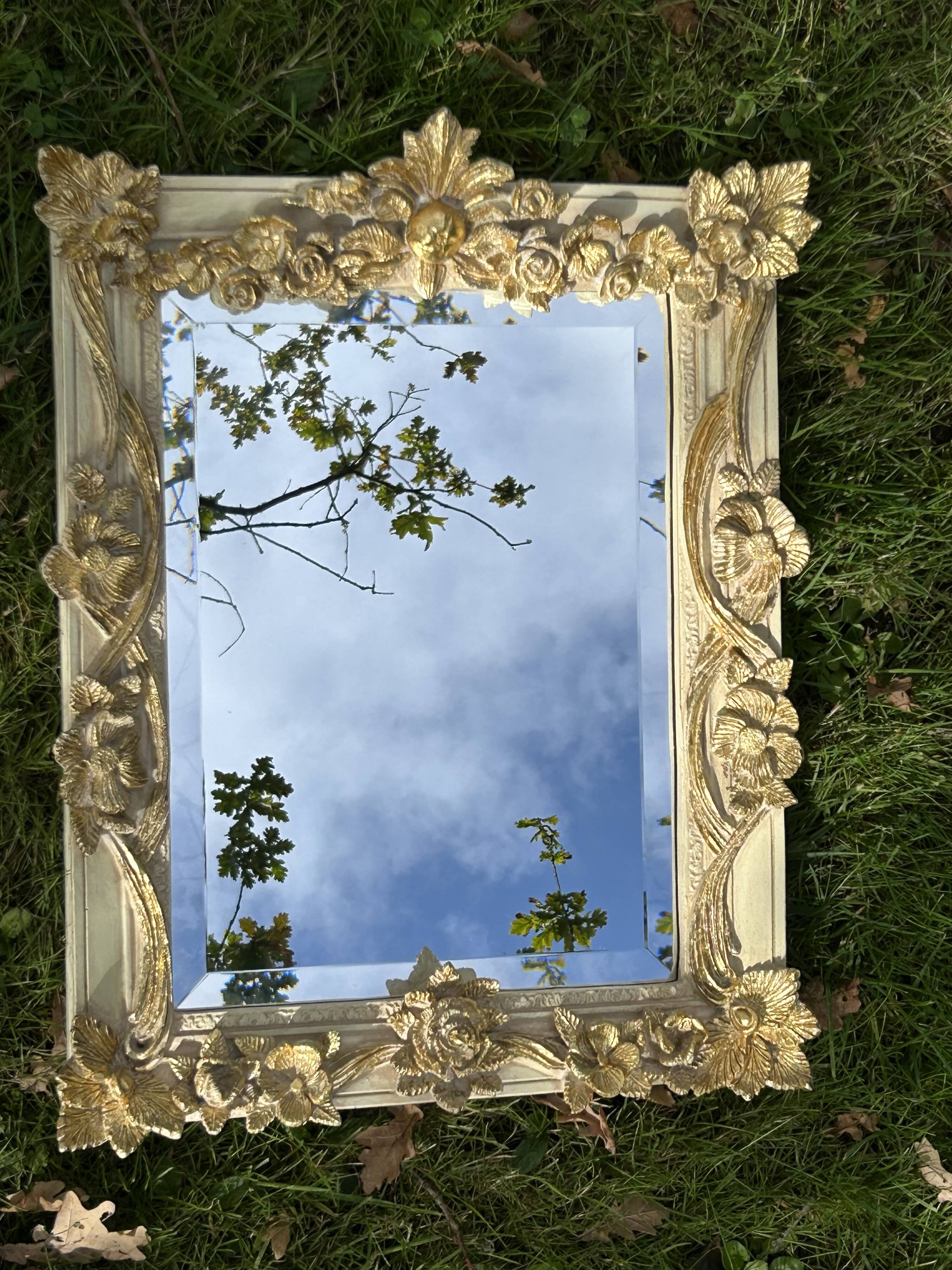 19th century style beveled mirror with garlands of flowers and leaves