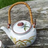 Vintage tea service in ceramic and rattan