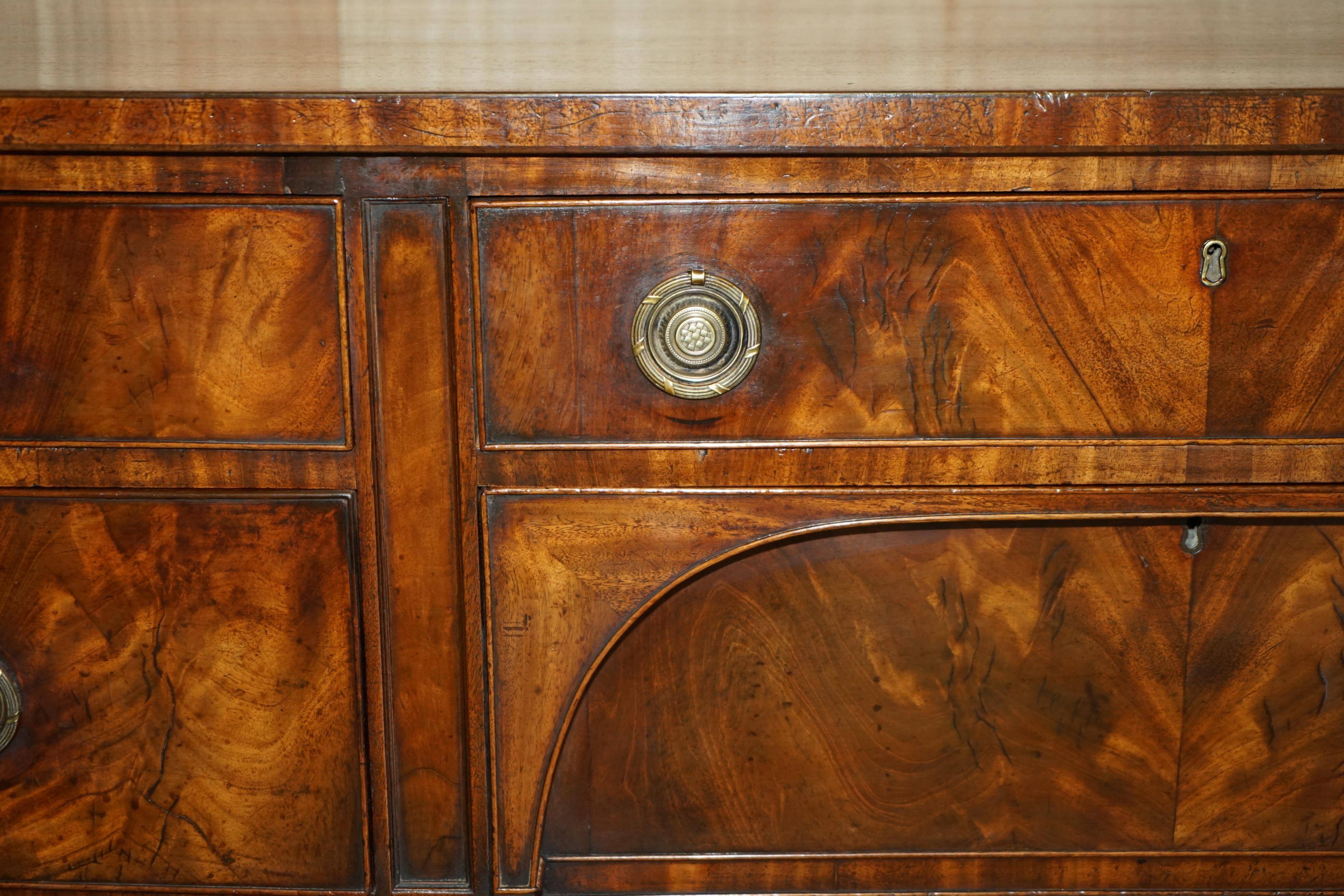 English buffet George III from around 1780 in restored flame wood.