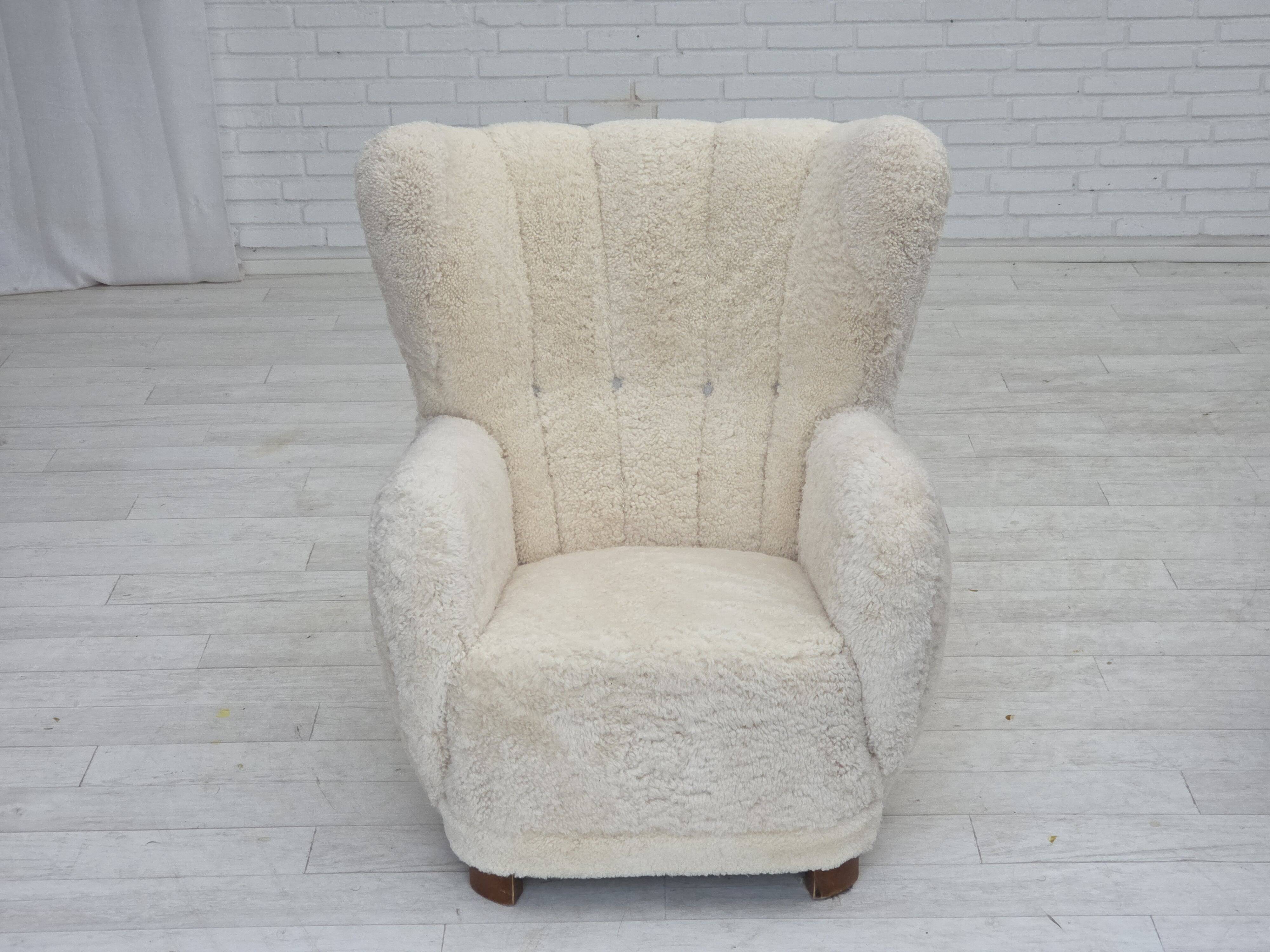 1960s, Danish design, reupholstered highback armchair, genuine sheepskin.