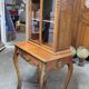 Louis XV bonheur du jour in rosewood marquetry decorated with bronze.