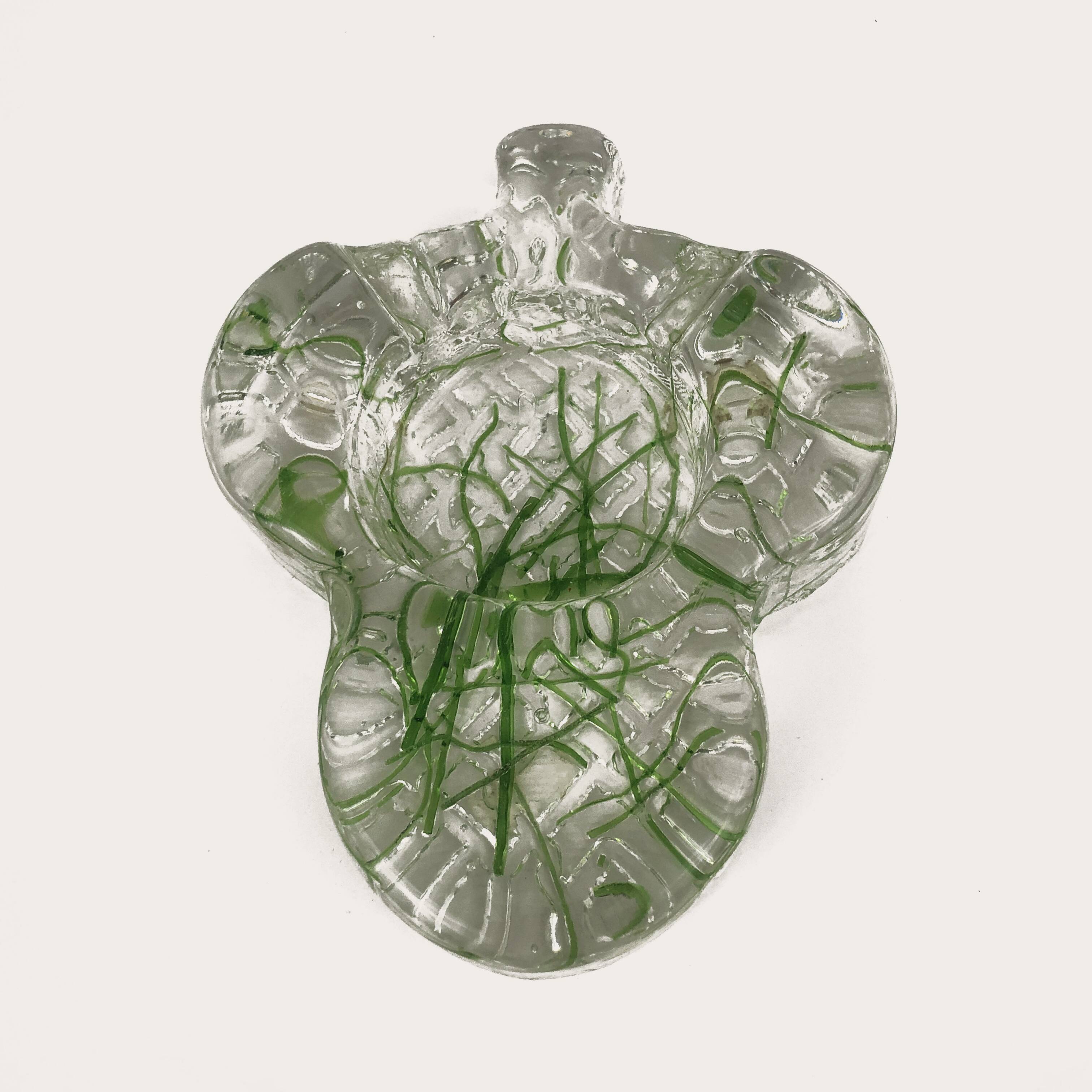 Maxi clover-shaped ashtray in transparent glass with herbivorous inclusions